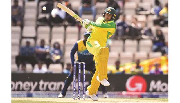 Australiau2019s Usman Khawaja plays a pulls shot during the World Cup warm-up match against Sri Lanka at the Rose Bowl in Southampton, southern England, yesterday. (AFP)