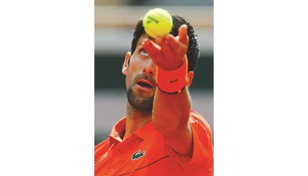 Serbiau2019s Novak Djokovic in action during his first round match against Polandu2019s Hubert Hurkacz.