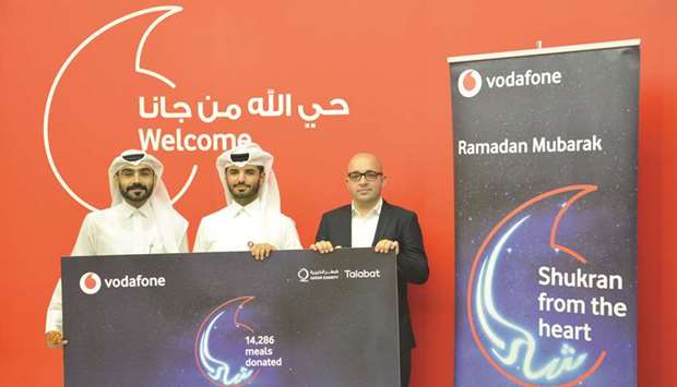 Ali al-Gharib, Mohamed Alyafei, Francisco De Sousa announce the success of the Iftar meal donation initiative.