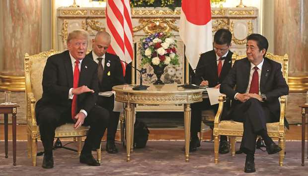 US President Donald Trump meets with Japanese Prime Minister Shinzo Abe at Akasaka Palace, Japanese state guest house in Tokyo yesterday.