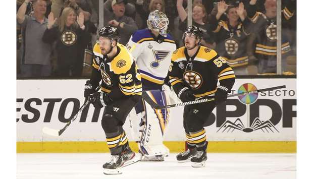 Sean Kuraly (left) of the Boston Bruins celebrates his third period goal against St. Louis Blues in game one of the 2019 NHL Stanley Cup Final at TD Garden in Boston, Massachusetts.  (Getty Images/AFP)