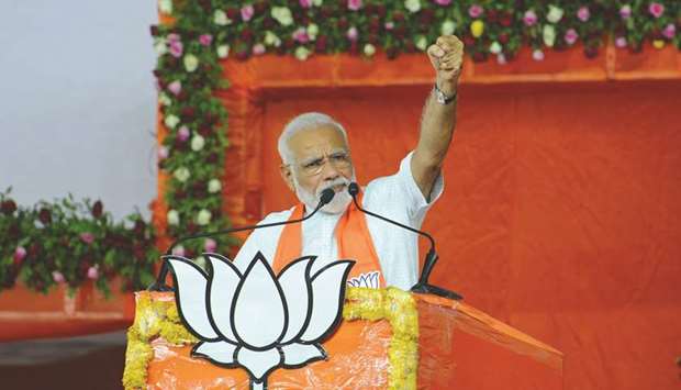 Indian designated Prime Minister Narendra Modi gestures during a rally in Ahmedabad on May 26.