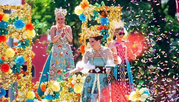 LARGEST PARADE: Many of the floats feature princesses decked out in elaborate beaded gowns depicting everything from the Texas, flag to the flora and fauna of the state, takes part in Battle of Flowers Parade, one of the largest parades in the country.