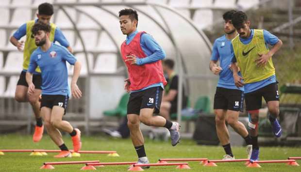 Qatar U-20 players take part in a training session ahead of their FIFA U-20 World Cup match against the United States yesterday.