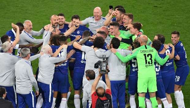 Chelsea's players celebrate after the final whistle of the UEFA Europa League final football match between Chelsea FC and Arsenal FC at the Baku Olympic Stadium in Baku, Azerbaijian