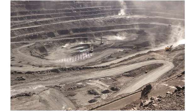 Miners are seen at the Bayan Obo mine containing rare earth minerals in Inner Mongolia. China produces more than 95% of the worldu2019s rare earths, and the US relies on the Asian superpower for upwards of 80% of its imports.
