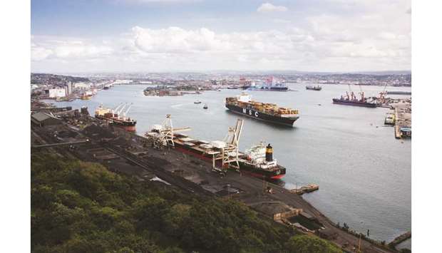 Shipping containers sit on board a cargo ship (centre) as it departs from the Port of Durban in Durban, South Africa (file). Africa, largely ignored in a US-China trade war that could roil economies worldwide, is quietly piecing together the worldu2019s largest free-trade zone.