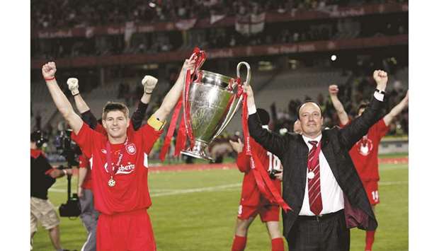 Liverpool Manager Rafael Benitez (right) and captain Steven Gerrard celebrate after winning the Champions League after they beat AC Milan in the final in Istanbul on May 25, 2005. (Reuters)