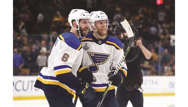 St. Louis Bluesu2019 Carl Gunnarsson (right) is congratulated by teammate Joel Edmundson for scoring the game-winning goal against Boston Bruins in the NHL Stanley Cup Final. (AFP)