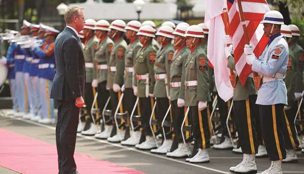 Acting US Defense Secretary Patrick Shanahan stands during a ceremony before his meeting with Indonesian counterpart Ryamizard Ryacudu yesterday in Jakarta, Indonesia.
