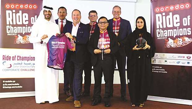 The winners at QSE Corporate Challenge trophy presentation.