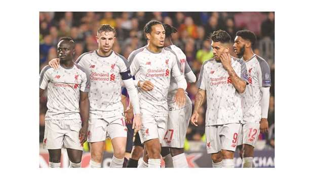 Liverpool travel to face the St Jamesu2019 Park side managed by former Reds boss Rafael Benitez a point behind leaders Manchester City with two matches to go. (AFP)