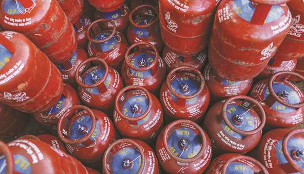 Hindustan Petroleum Corp liquefied petroleum gas cylinders sit stacked at a depot operated by the company in Mumbai. Indiau2019s demand for liquefied petroleum gas rose to a record in the fiscal year ended in March amid government measures to provide cleaner cooking fuel to rural households.