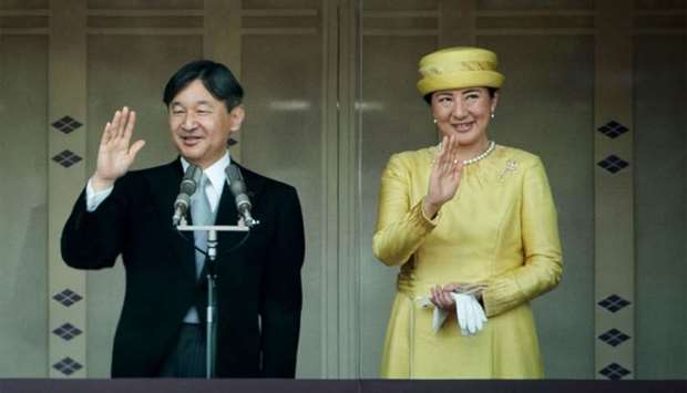 Japan's Emperor Naruhito (L) and Empress Masako (R) make their first public appearance after ascending to the throne at the Imperial Palace in Tokyo