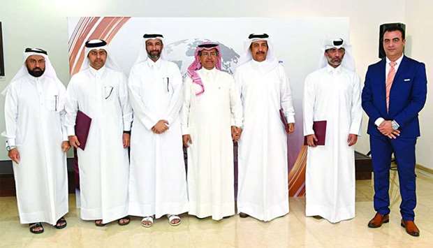 Sheikh Dr Faleh bin Nasser al-Thani and other MME officials with the representative of the organisations honoured on the occasion.