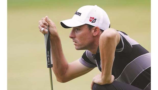 Benjamin Hebert of France lines up a putt in Shenzhen, China.