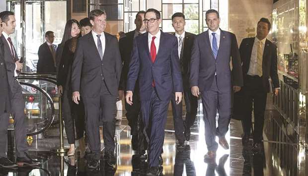 Steven Mnuchin, US Treasury secretary (centre), arrives at a hotel in Beijing (file).