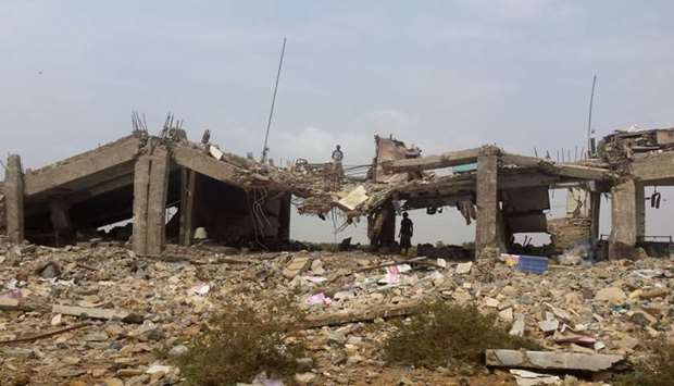 A destroyed building is pictured in the area of Yemen's northern coastal town of Midi