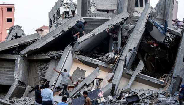 Remains of a building in Gaza City after it was hit during Israeli air strikes