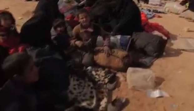 Women and children from IS territories in a refugee camp