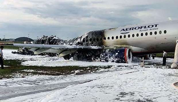 Destroyed fuselage at a site of a fire of a Russian-made Superjet-100 at Sheremetyevo airport outside Moscow following its crash