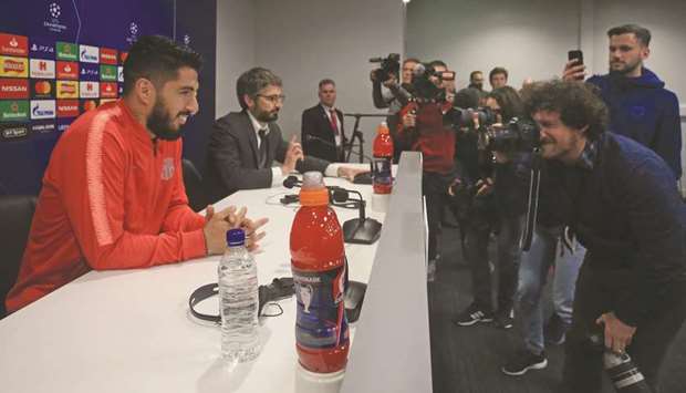 Barcelonau2019s striker Luis Suarez (left) poses for a picture before the press conference yesterday, on the eve of the UEFA Champions League semi-final second leg match against Liverpool. (AFP)