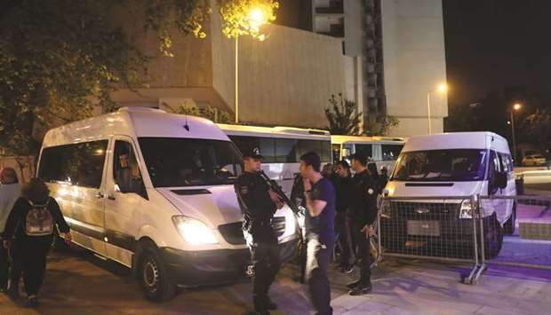 Turkish riot police guard the headquarters of the Supreme Electoral Council in Ankara last night.