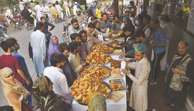 Pakistanis buying Iftar food in Rawalpindi.