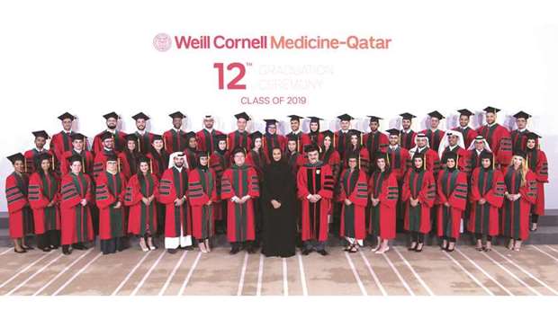 The graduates with HE Sheikha Hind bint Hamad al-Thani and Dr Javaid Sheikh. (Supplied picture).