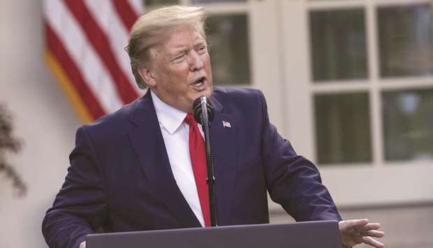 US President Donald Trump speaks at an event in the Rose Garden of the White House in Washington, DC. Trump, who has embraced largely protectionist policies as part of his u201cAmerica Firstu201d agenda, has warned China that it was mistaken if it hoped to delay a trade deal until a Democrat controlled the White House.