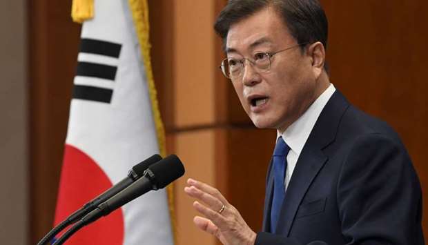 South Korean President Moon Jae-in speaks on the occasion of the third anniversary of his inauguration at the presidential Blue House in Seoul, South Korea