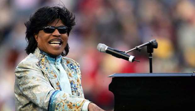 A December 31, 2004, file photo of Little Richard performing during the halftime show of the game between the Louisville Cardinals and the Boise State Broncos at the Liberty Bowl in Memphis, Tennessee.