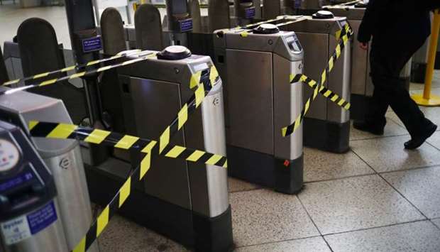 Taped ticket barriers at Westminster underground station, following the outbreak of the coronavirus disease, London, Britain