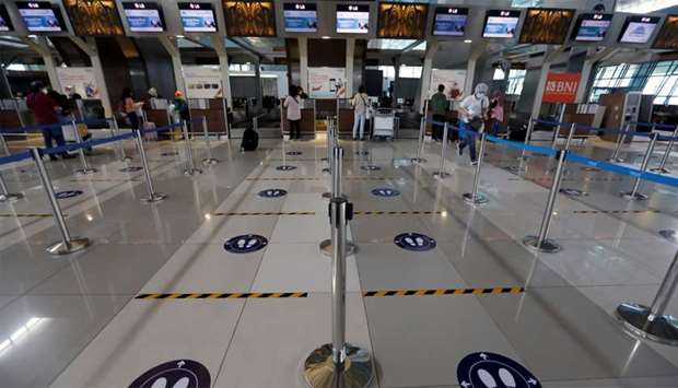 A view shows social distancing marks on the floor at the check-in counters of the Soekarno-Hatta International Airport, amid the spread of coronavirus disease (COVID-19) outbreak, in Tangerang near Jakarta, Indonesia