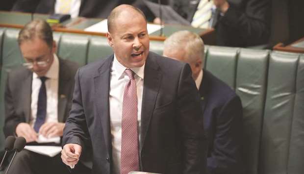 Josh Frydenberg, Australiau2019s treasurer, speaks in the House of Representatives chamber at Parliament House in Canberra (file). Frydenberg will lay out some of the economic benefits of the relaxations in restrictions in his speech today.