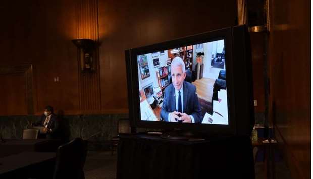 Dr. Anthony Fauci, Director of the National Institute of Allergy and Infectious Diseases, testifies remotely via teleconference, during a Senate Committee for Health, Education, Labor, and Pensions hearing to examine Covid-19 on May 12,  in Washington,DC