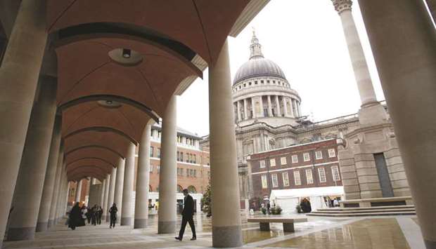 The walkway seen outside the London Stock Exchange building in Paternoster Square. The FTSE 100 closed up 1.0% to 5,800.33 points yesterday.