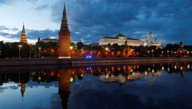 An ambulance moves past Kremlin as the spread of the coronavirus disease (COVID-19) continues in Moscow, Russia