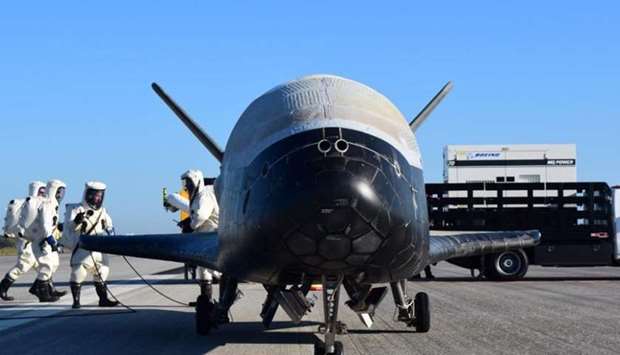 In this file photo released by the US Air Force, the Air Force's X-37B Orbital Test Vehicle mission 4 lands at NASA 's Kennedy Space Center Shuttle Landing Facility in Florida, on May 7, 2017