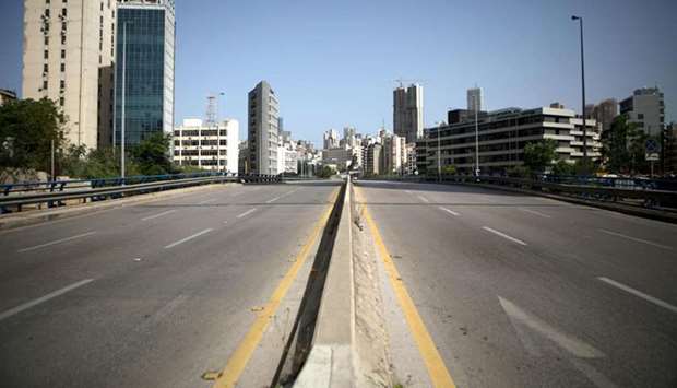 A picture taken yesterday, shows a deserted road on the southeastern outskirts of the Lebanese capital Beirut, during a lockdown imposed by the authorities due to Covid-19.
