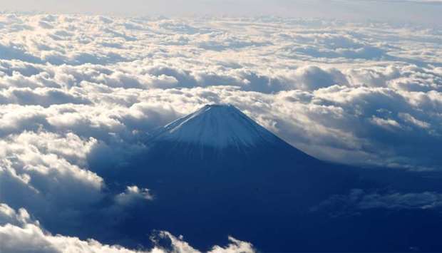 Mount Fuji is seen from a plane in Japan