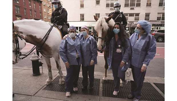NYPD Mounted Unit officers visit Lenox Hill Hospital to show gratitude to the medical staff in New York City.