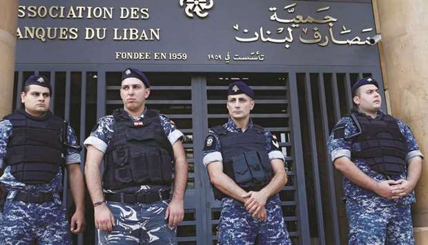 Lebanese police stand outside the entrance to the Association of Banks in downtown Beirut (file).