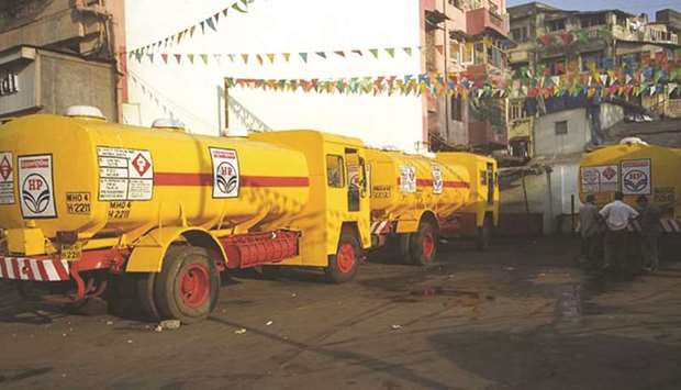 A Hindustan Petroleum tanker delivers fuel to a petrol pump in central Mumbai. Once the engine of global oil demand growth, Indiau2019s fuel consumption collapsed by as much as 70% at one stage last month as it embarked on one of the worldu2019s most stringent nationwide quarantines. As the lockdown eases, itu2019s now running at about 40% below last yearu2019s levels and could take until the end of 2020 to get close to full recovery, according to executives at the countryu2019s state-owned fuel retailers.