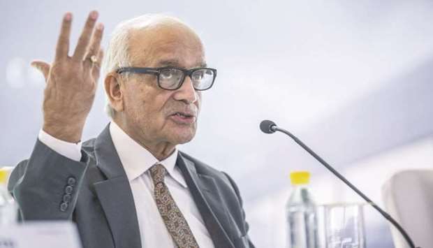 RC Bhargava, chairman of Maruti Suzuki India, gestures while speaking during the second-quarter earnings news conference at the companyu2019s headquarters in New Delhi (file). Bhargava said he expects a car-sales boom after the lockdown is lifted as customers appear more motivated to buy than before the pandemic because they see personal vehicles as safer than public transport.