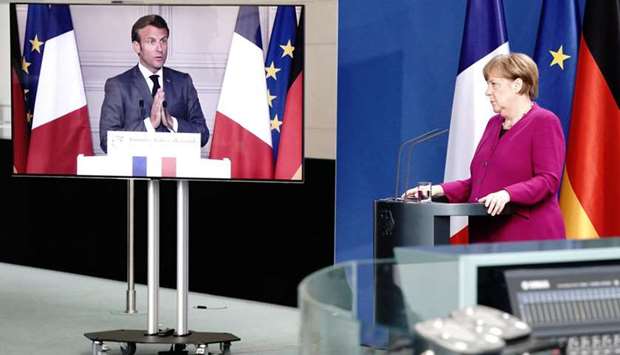 German Chancellor Angela Merkel holds a joint video news conference with French President Emmanuel Macron. European economic and political conditions could be completely transformed by the Merkel-Macron planu2019s financial innovations.