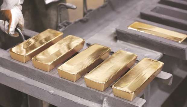 Freshly cast gold ingot bars sit in the foundry at a non-ferrous metals plant in Krasnoyarsk, Russia. Gold funds are drawing a surge in interest partly because theyu2019re backed by actual bars of the precious metal, making them better able to track the underlying assetsu2019 spot price when markets go haywire.