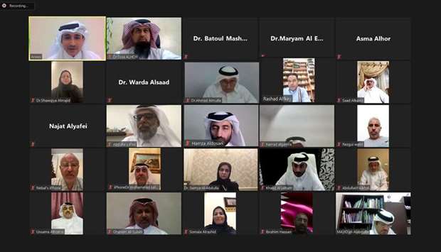 Members of the Qatar Medical Association holding a remote meeting.