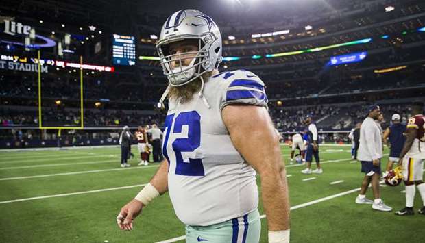 Dallas Cowboys centre Travis Frederick walks off the field after a 47-16 win against the Washington Redskins at AT&T Stadium in Arlington, Texas, on December 29, 2019. (TNS)