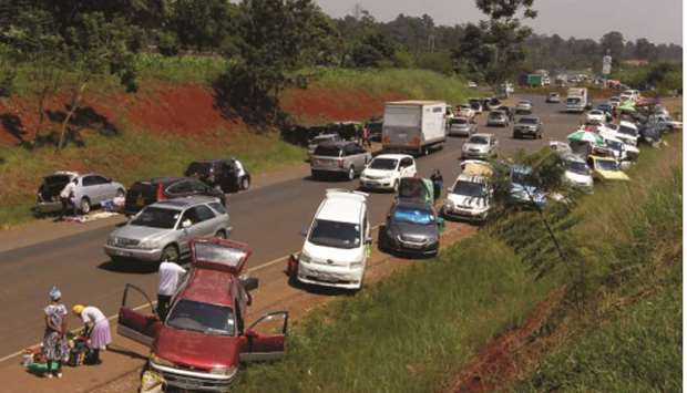 A general view shows vehicles parked and used as alternative mobile grocery stalls along the highway, following a lockdown due to the coronavirus disease (Covid-19) outbreak, on the outskirts of Nairobi, Kenya yesterday.